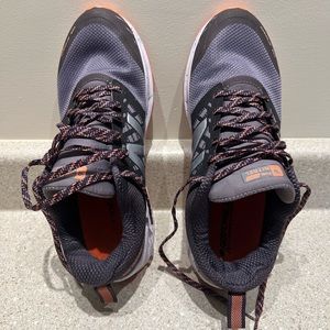 Gently used women’s New Balance running sneakers size 9.5.